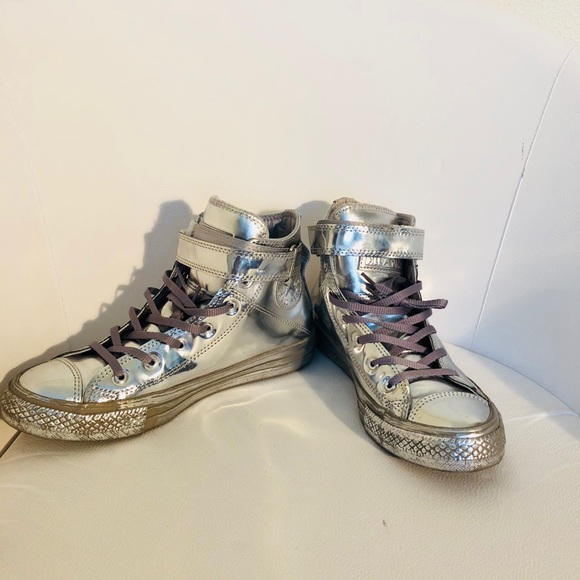 silver metallic high top converse